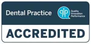 Q I P Accredited dental practice logo